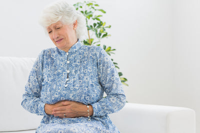 elderly-woman-having-belly-pain